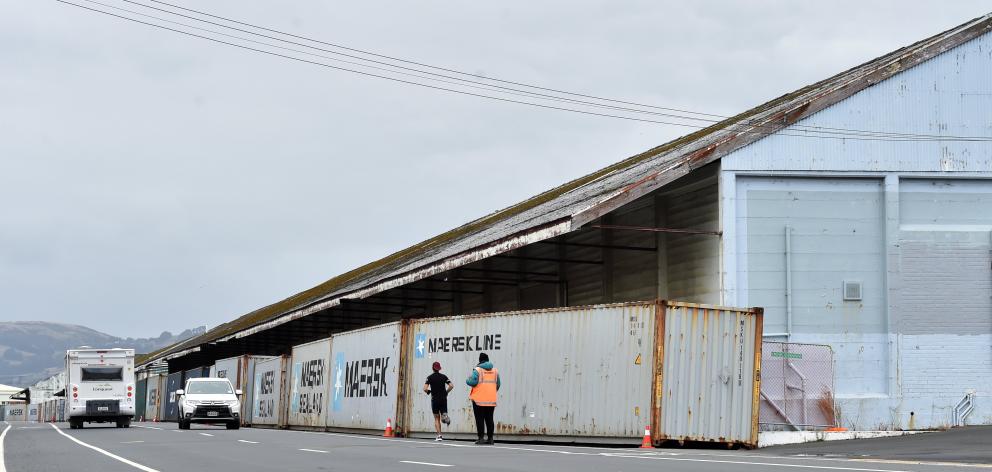 Containers block harbourside sheds in Fryatt St after the discovery of asbestos earlier this year...