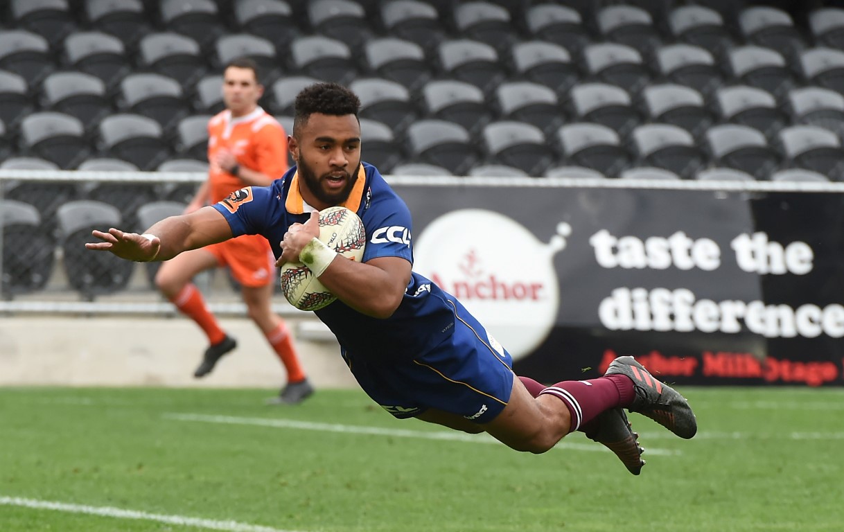 Jona Nareki dives over for one of his three tries. Photo Gregor Richardson