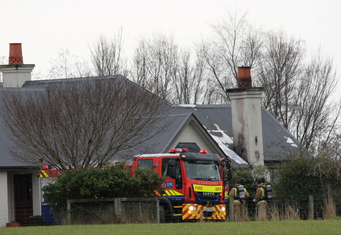 Firefighters at the scene this morning. Photo: Janette Gellatly