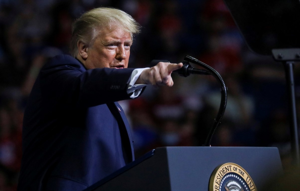 Donald Trump gestures as he speaks during his first re-election campaign rally in several months,...