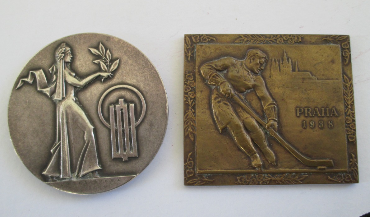 A round silver Lithuanian olympiad medal and a bronze rectangular 1938 Lithuanian ice hockey team...