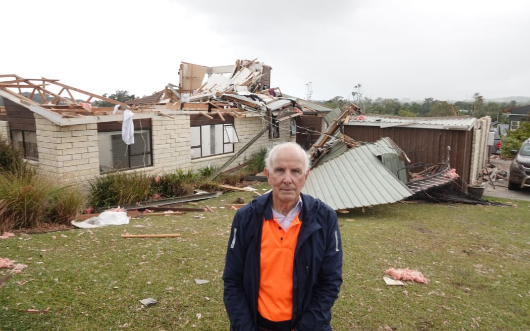 Alan Johnson in front of his Old Waipu Rd home. Photo: RNZ