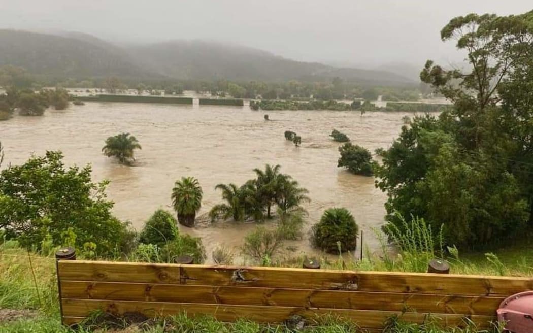 Properties in Eskdale, in Hawke's Bay, were heavily inundated after the nearby river broke its...