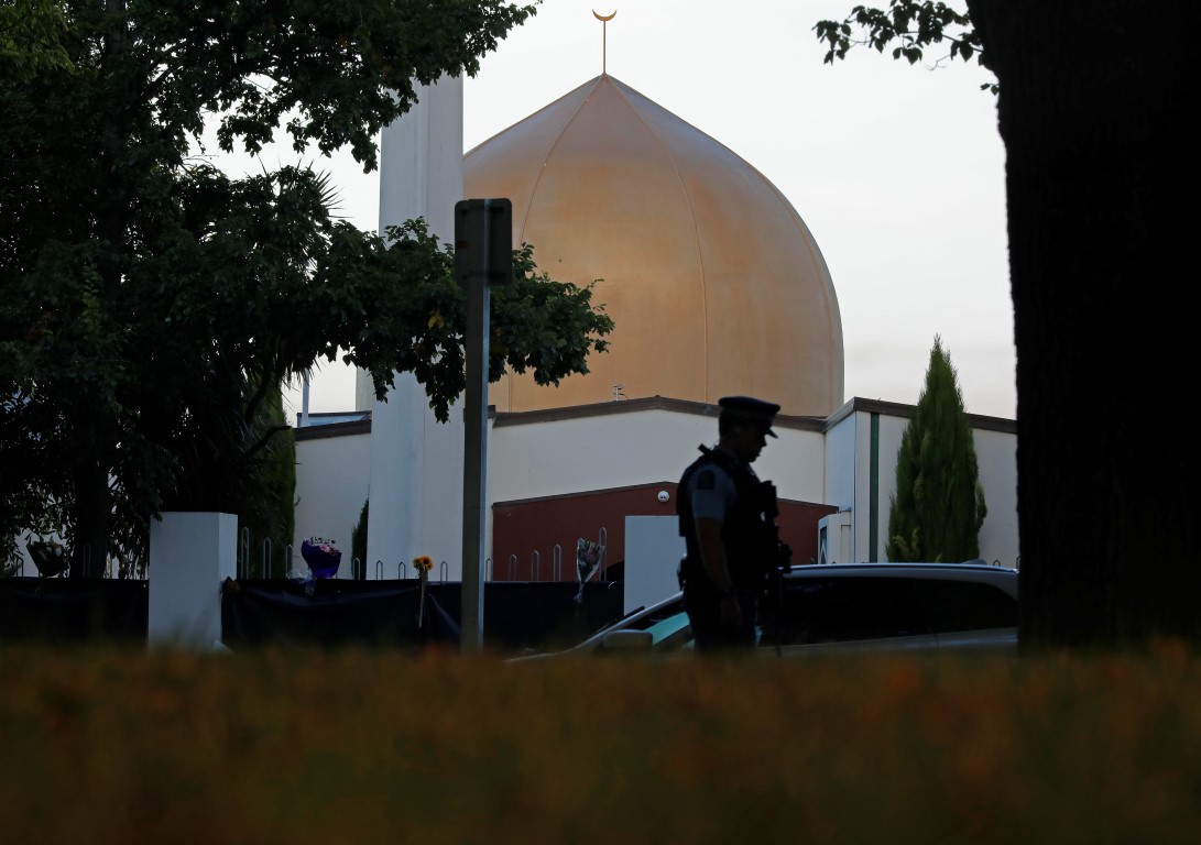 A police officer stands guard in front of the Al Noor mosque in Christchurch. Photo: AP