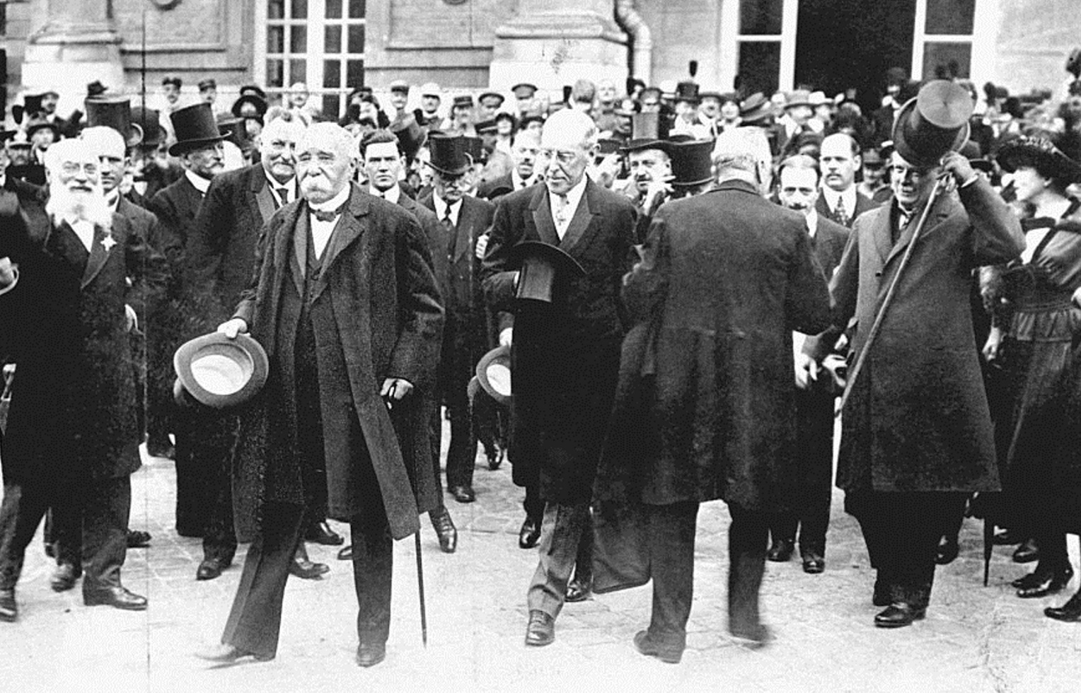 French Prime Minister Georges Clemenceau (left), US President Woodrow Wilson (centre) and British...