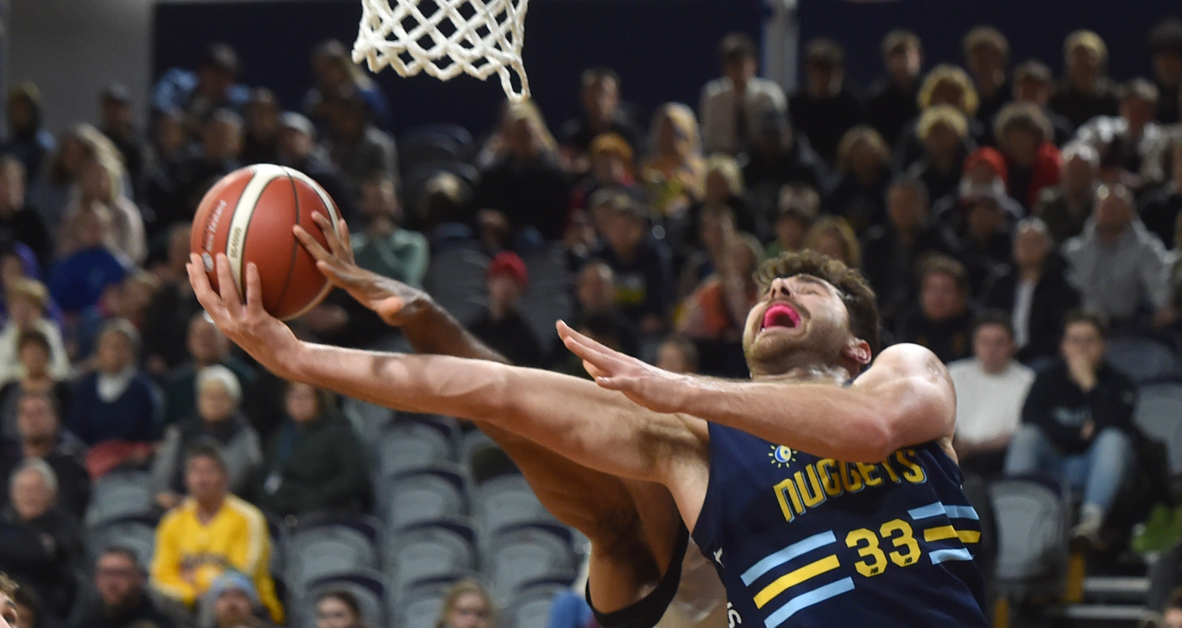 Captain Sam Timmins tries to make the basket. PHOTO: PETER MCINTOSH