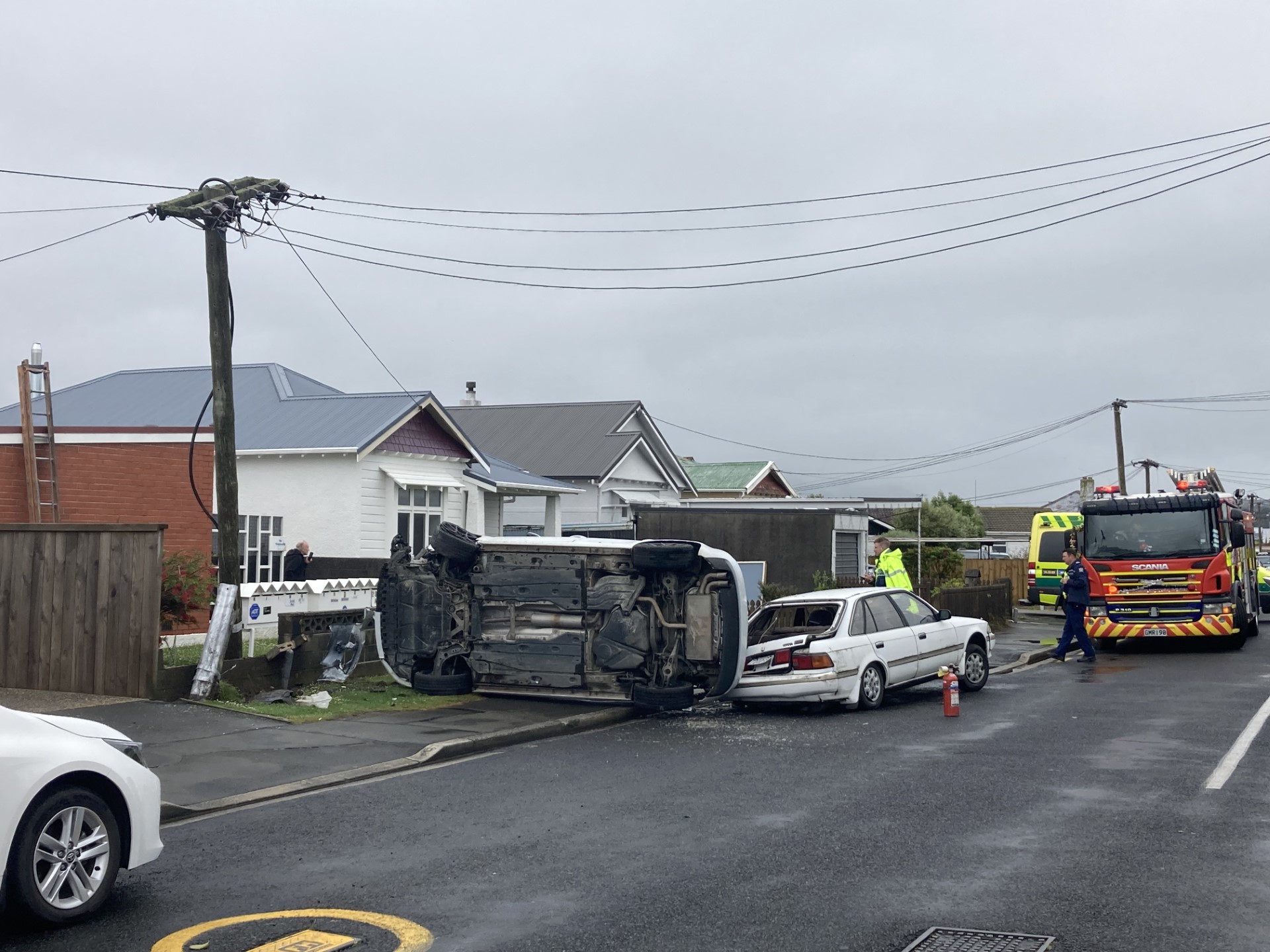 Emergency services at the scene of the Bay View Rd crash. PHOTO: STEPHEN JAQUIERY 