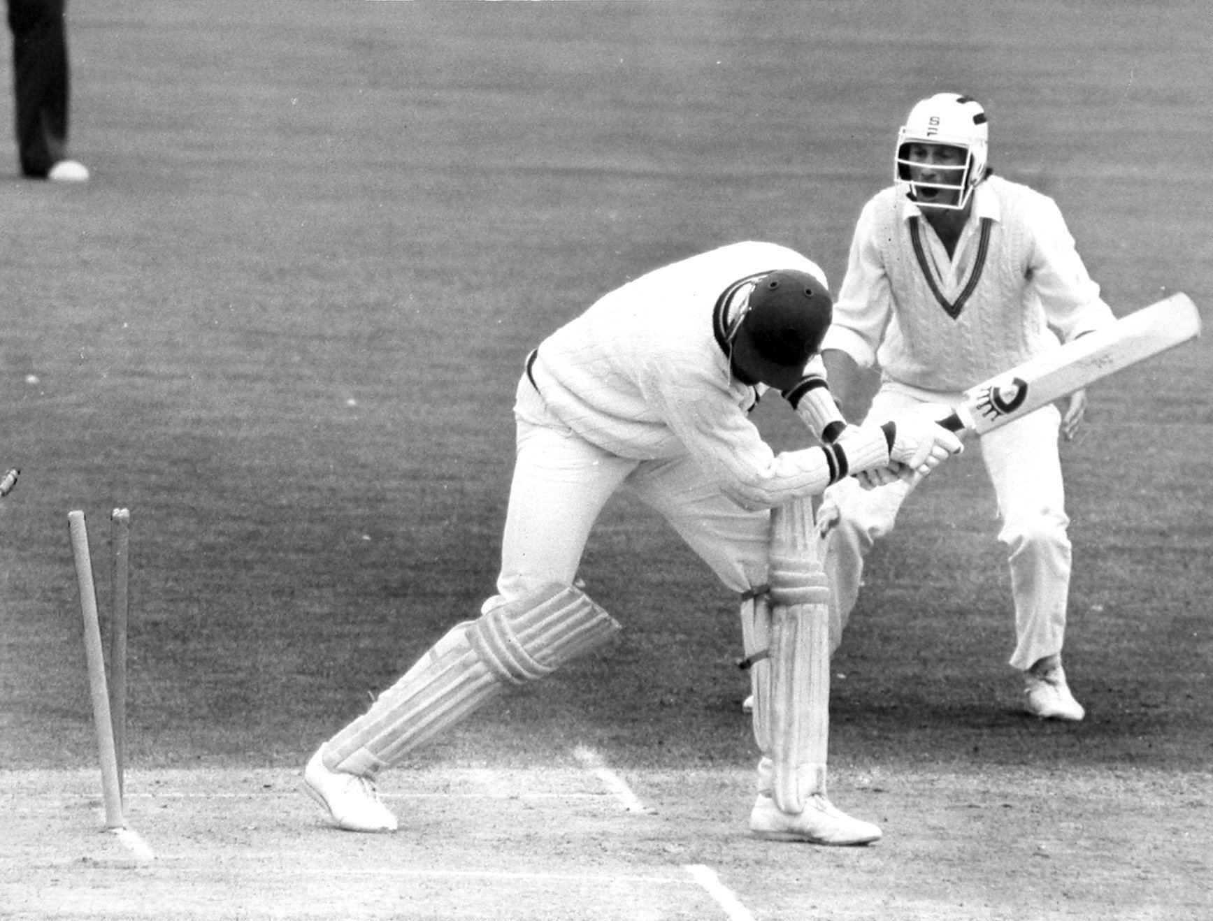 New Zealand fielder Stephen Boock celebrates as West Indian tailender Joel Garner is bowled...