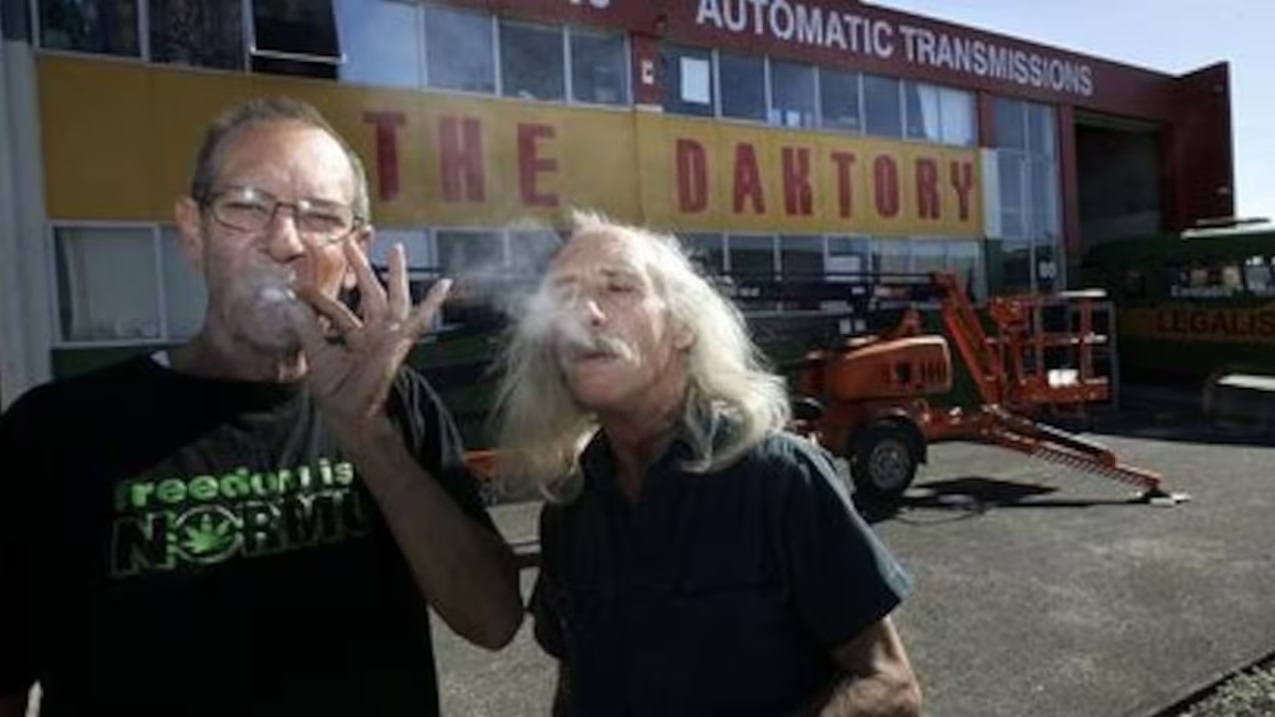 Dakta Green and Brian Borland outside the Daktory in New Lynn, which was raided in 2010.