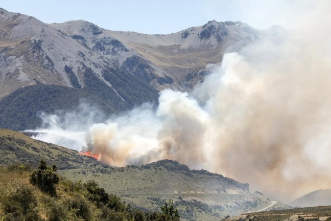 The blaze seen from Cave Stream. Photo: RNZ