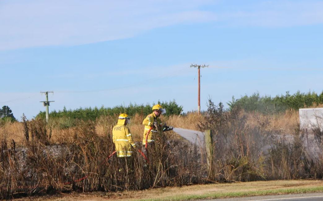 Firefighters fighting a series of fires along the railway line near Kirwee, west of Christchurch....