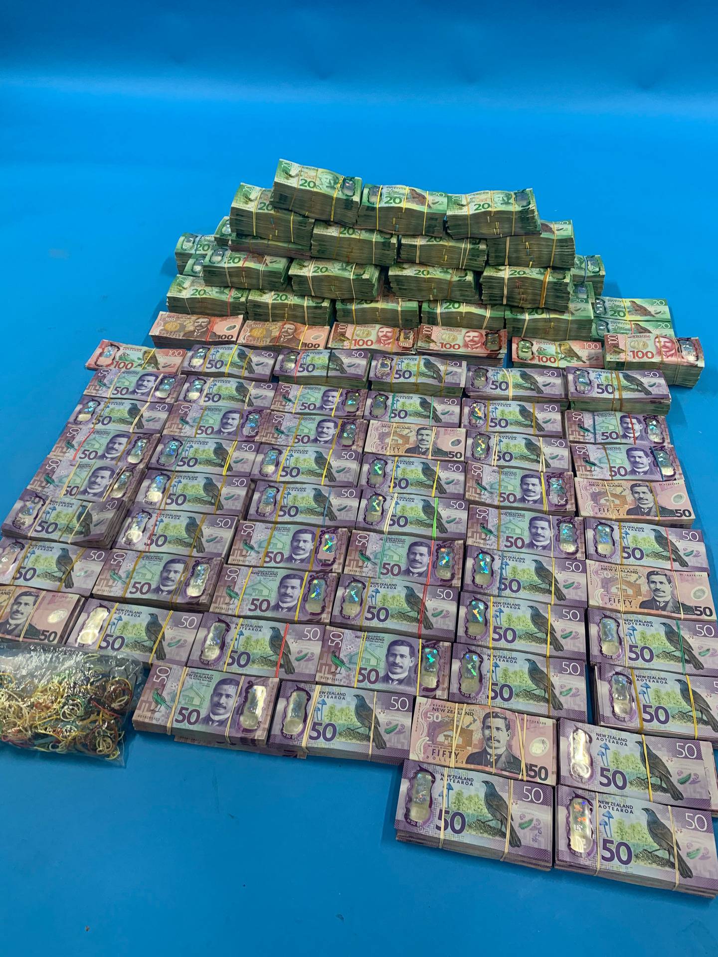 More than $1m cash was seized in New Zealand following the global coordinated sting on organised...