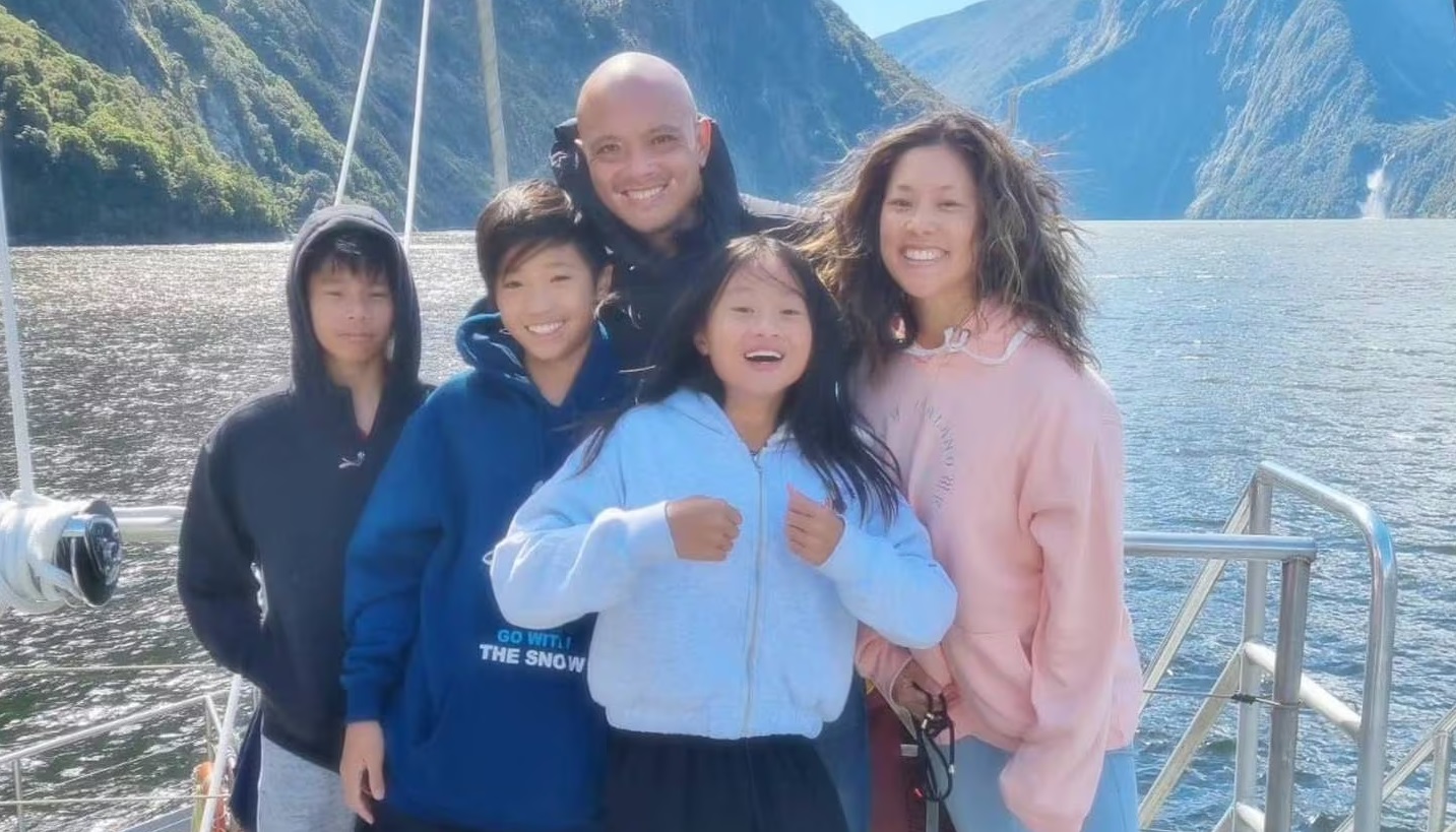 Tegan Chen (centre) with her family before her death. Supplied photo