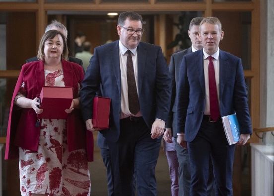 Housing Minister Megan Woods, Finance Minister Grant Robertson and Prime Minster Chris Hipkins on...