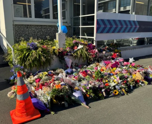 Flowers outside the Nelson Police Station. Photo: Pretoria Gordon / RNZ