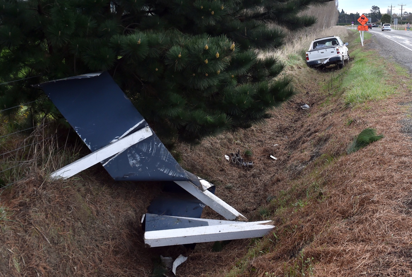 A vehicle in the ditch on the corner of State Highway 1 and Coast Rd near Hawksbury this morning....