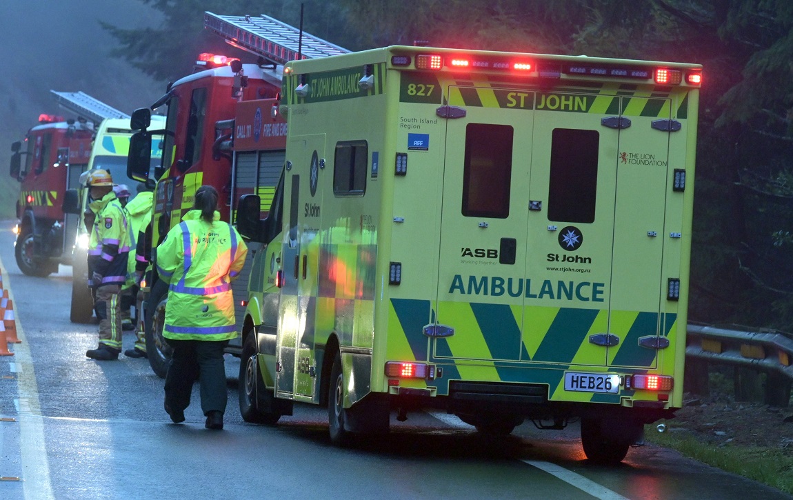 Emergency services at the scene of the crash this afternoon. PHOTO: LINDA ROBERTSON