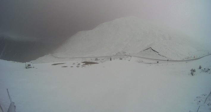 Snow blankets the summit of the Crown Range this morning. The mountain pass is open but chains...