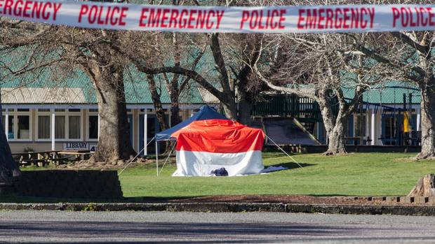 Police are guarding entrances to St Michael's Catholic School. Photo: Stephen Parker via NZ Herald