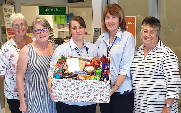 Members of the Rural Women's Network delivered boxes of food to services helping victims of the...