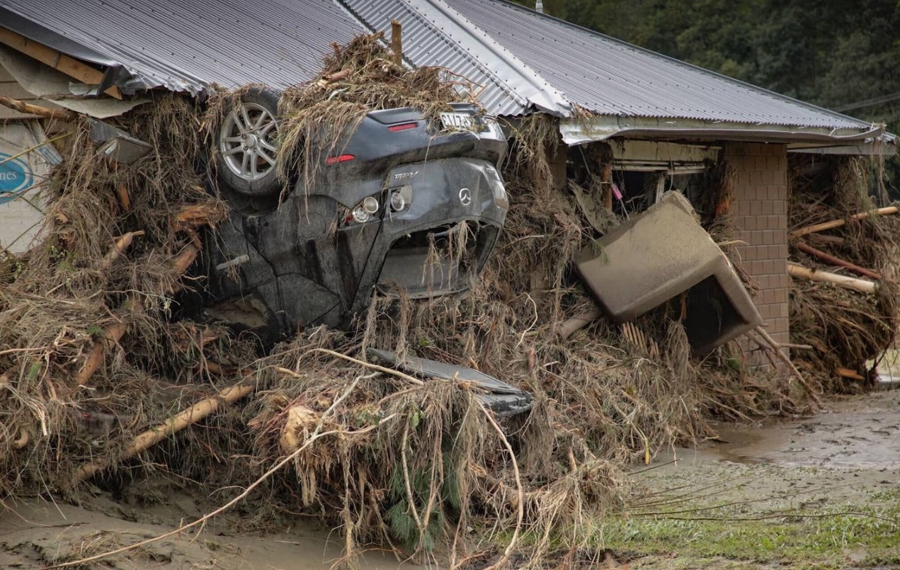 Raging flood waters flipped this car upside down at a house in Shaw Rd, in Napier's Esk Valley....