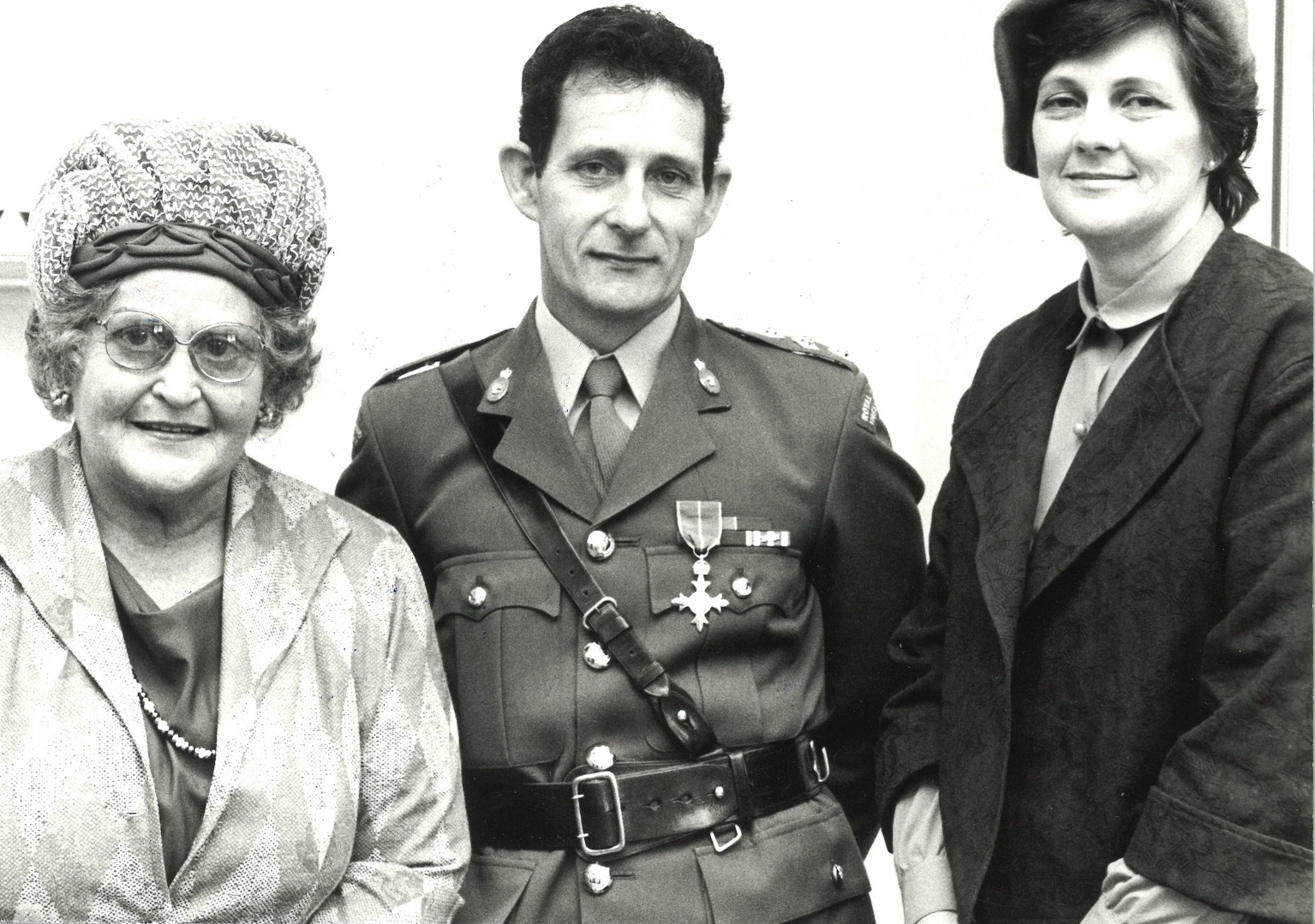 Major Frederick Daniel with his mother Celia Daniel and his wife Pat Daniel at Government House...