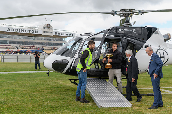 Richie McCaw delivers the New Zealand Trotting Cup in his helicopter. Photo: Getty