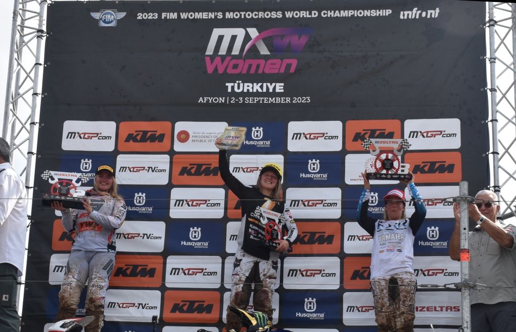 Celebrating on the podium in Afyonkarahisar, Turkiye are Women's Motocross World Championship winner Courtney Duncan (C), second-placed Daniela Guillen (R) and third-placed Lotte van Drunen. Photo: Getty Images