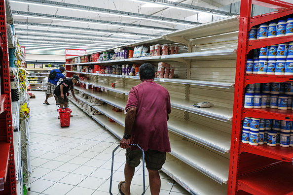 Empty shelves at a supermarket in the Magenta district of Nouméa. Photo: Getty Images