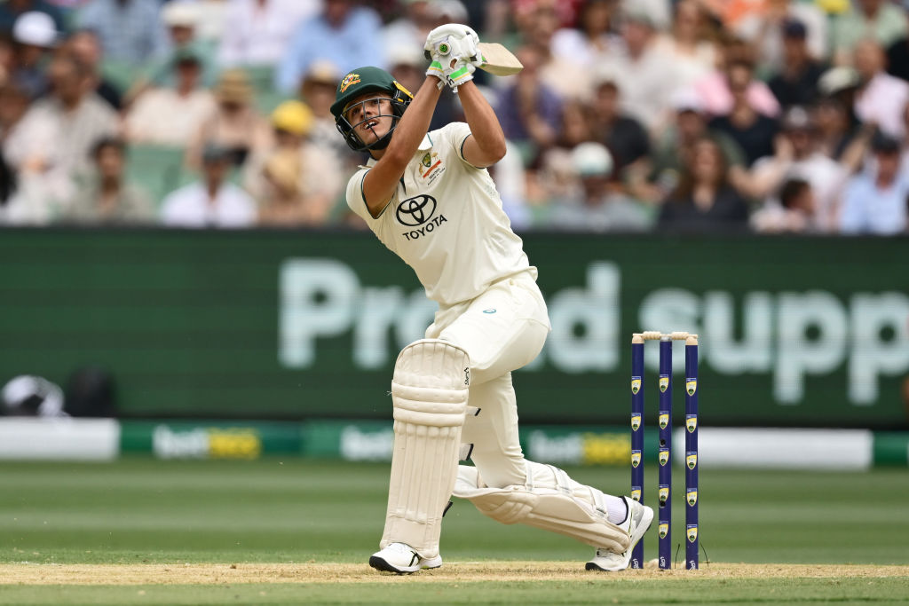 Australia's Sam Konstas hits out against India on day one of the fourth test at the Melbourne...