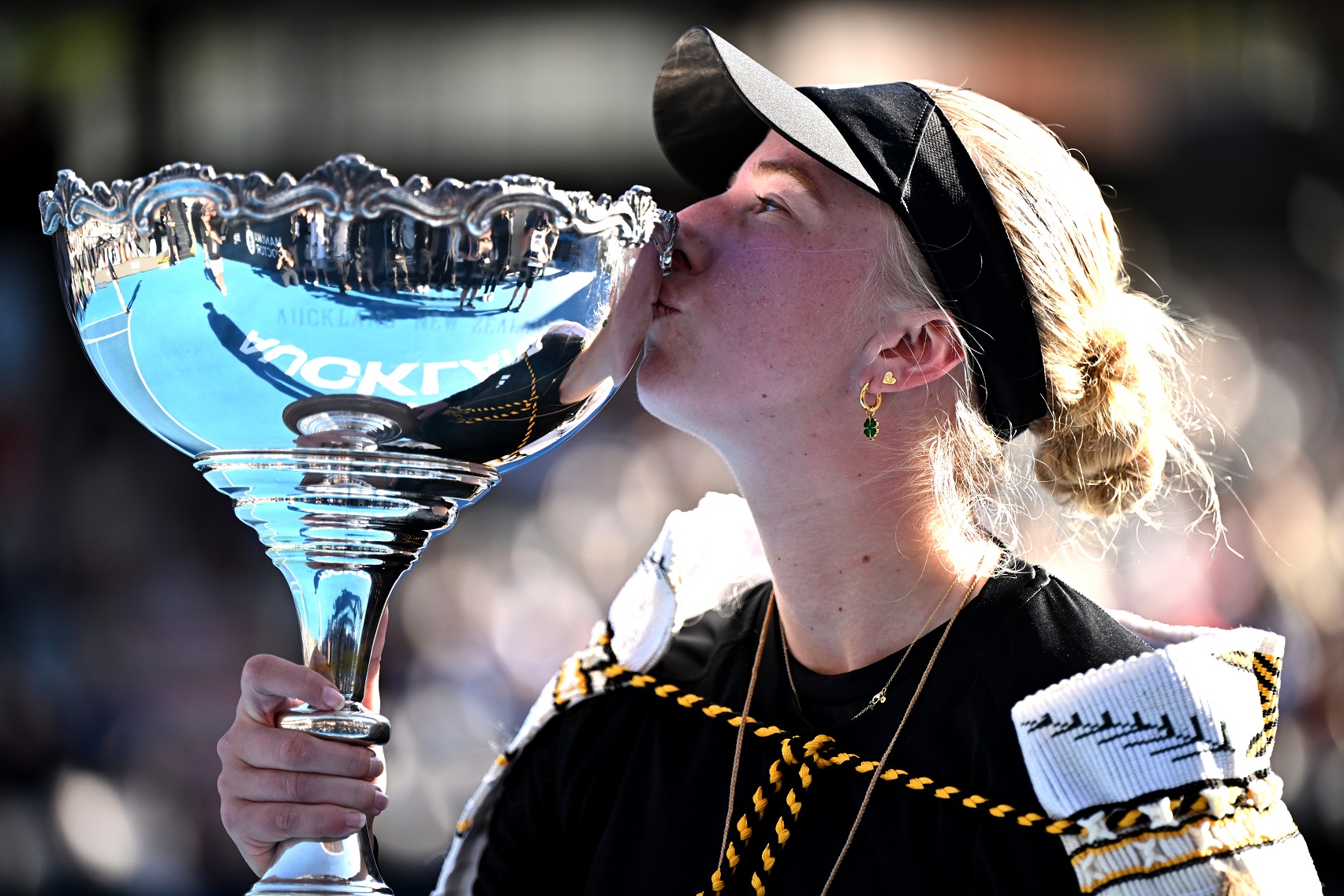 Clara Tauson of Denmark celebrates with the trophy after winning the women's singles final match...