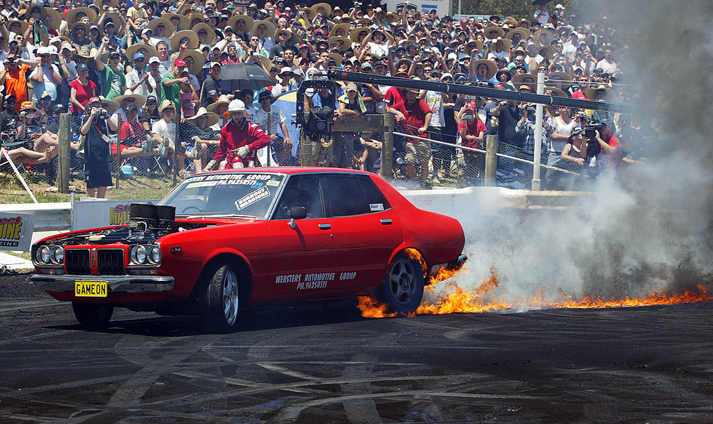 A car performs in the burnout competition during an earlier edition of Summernats in Canberra....