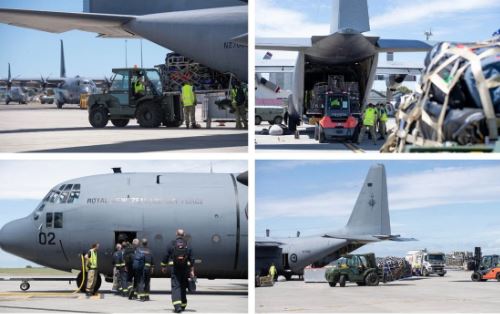 A Hercules C130 H is loaded up with HADR supplies to deliver to Vanuatu and emergency workers get...