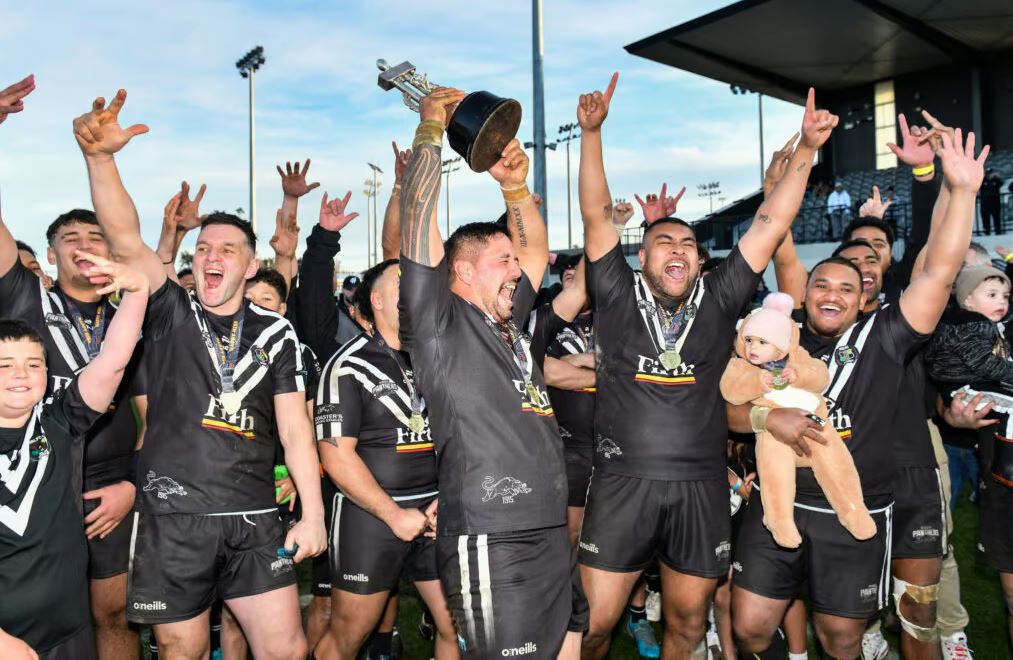 The Hornby Panthers lift the Pat Smith Trophy after beating Halswell Hornets 20-18. PHOTO:...