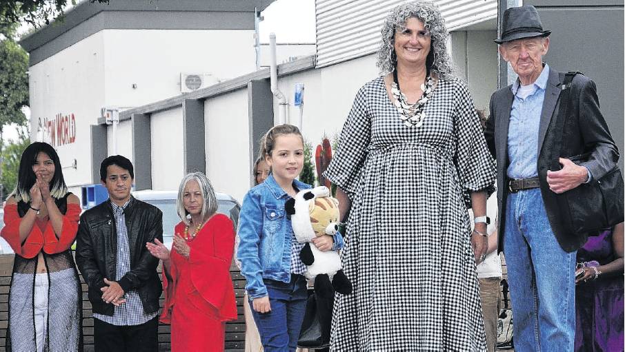 Cedar Higham-Price, 9, with Julie Tinomana and David Blackledge, representing the St John...