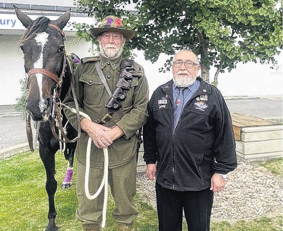 Peter Dixon and Owen Phillips from the Rangiora RSA honouring the wartime service of animals at a...