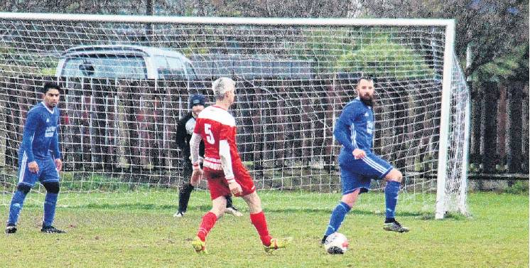 Veteran Old Boys player Danny Rosel looks for the through ball during his team’s match against...