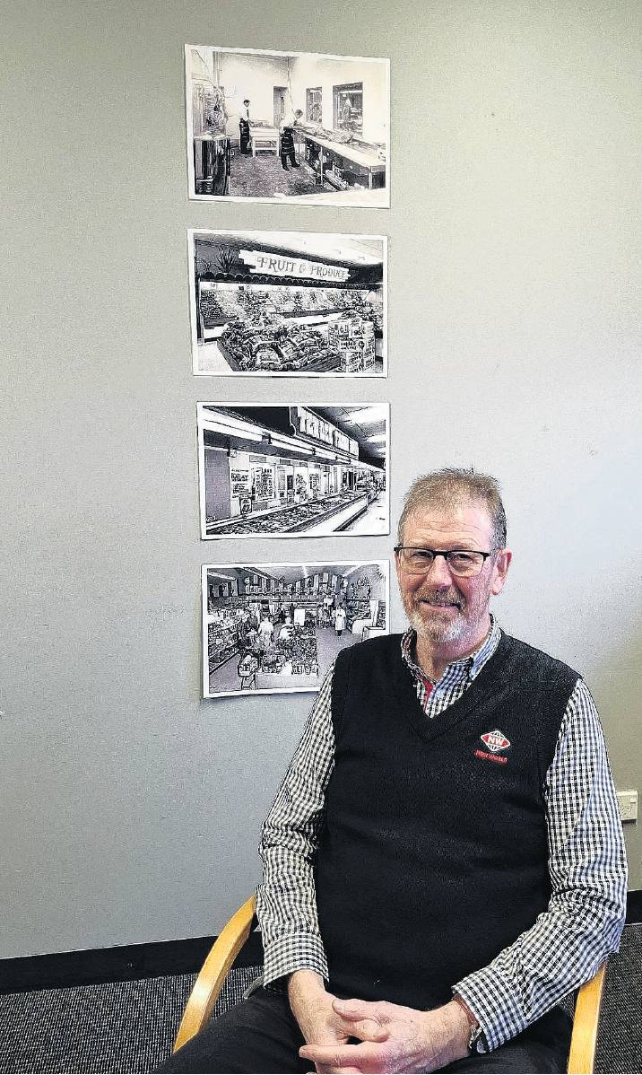 Robin Brown with a photographic mural of Brown Bros in Belfast in the background. PHOTO: ROBYN...