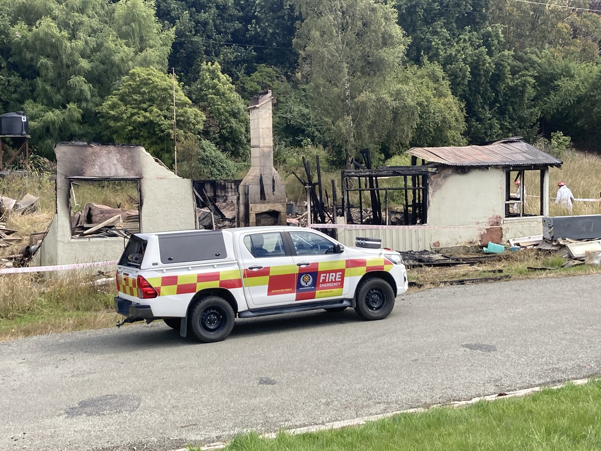 Fire investigators at the scene in Pukeuri, north of Oamaru.  Photo: Stephen Jaquiery