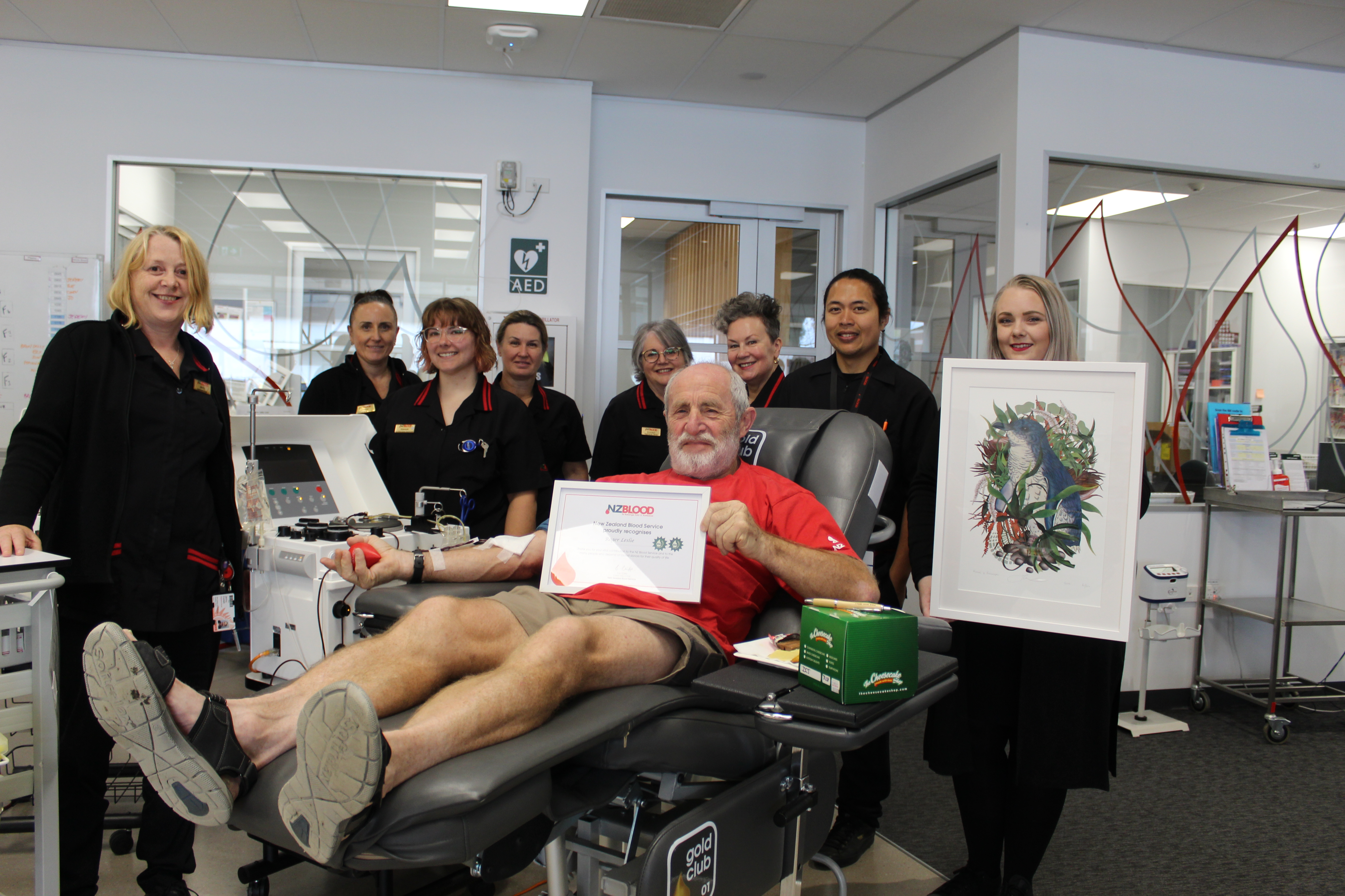 NZ Blood staff gather to celebrate as Roger Leslie gives his 400th donation. Mr Leslie was also...