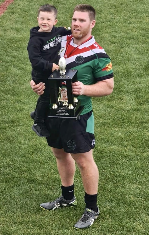 Linwood Keas stalwart Alex Todd - with son Izaac after the Canterbury Rugby League premiership...