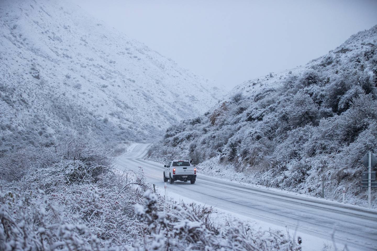 Motorists were instructed to use chains on the Crown Range Road today. Photo: George Heard