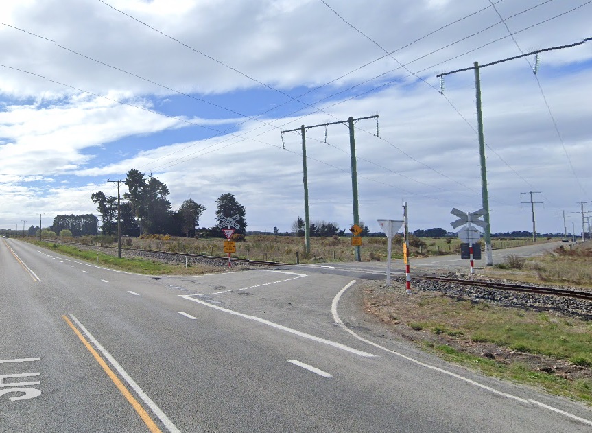 The railway crossing at the intersection of State Highway 1 and Kaik Rd. Photo: Google Mpas