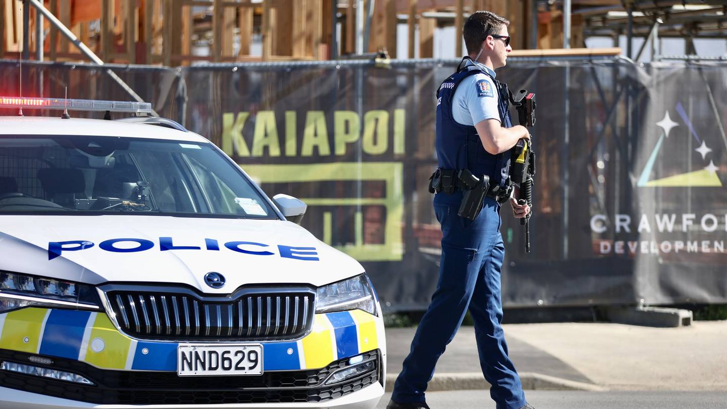 Armed police have blocked off a road in Christchurch. Photo: George Heard / NZH