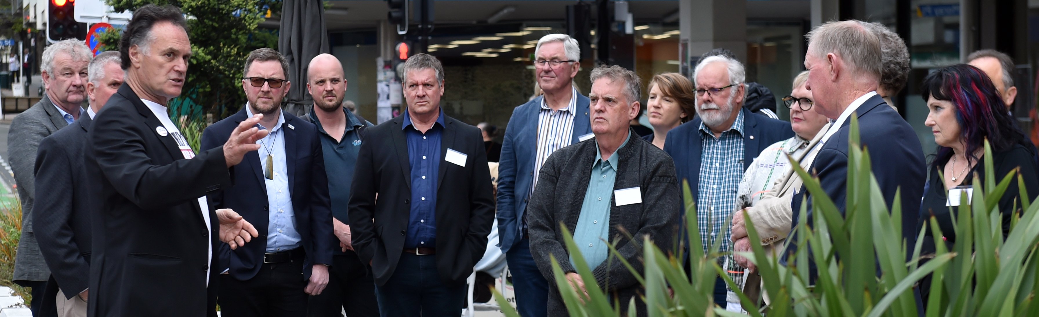 Dunedin Mayor Jules Radich talks to Ashburton mayor Neil Brown, far left, and a group of...