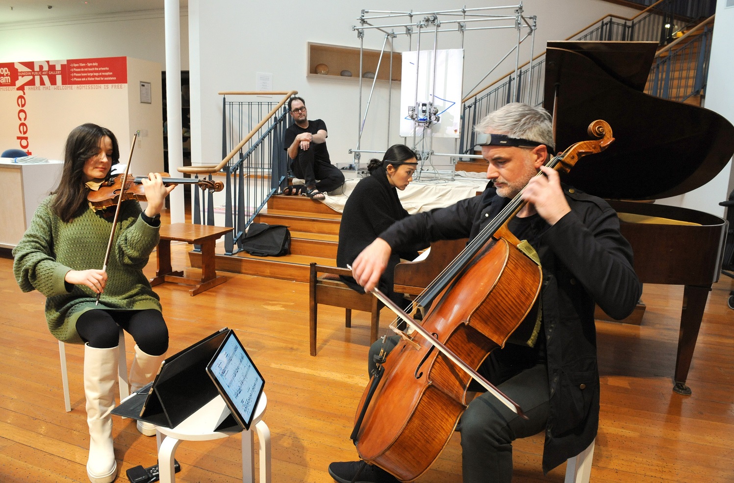 NZTrio musicians Amalia Hall (violin), Somi Kim (piano) and Ashley Brown (cello) rehearse at the...