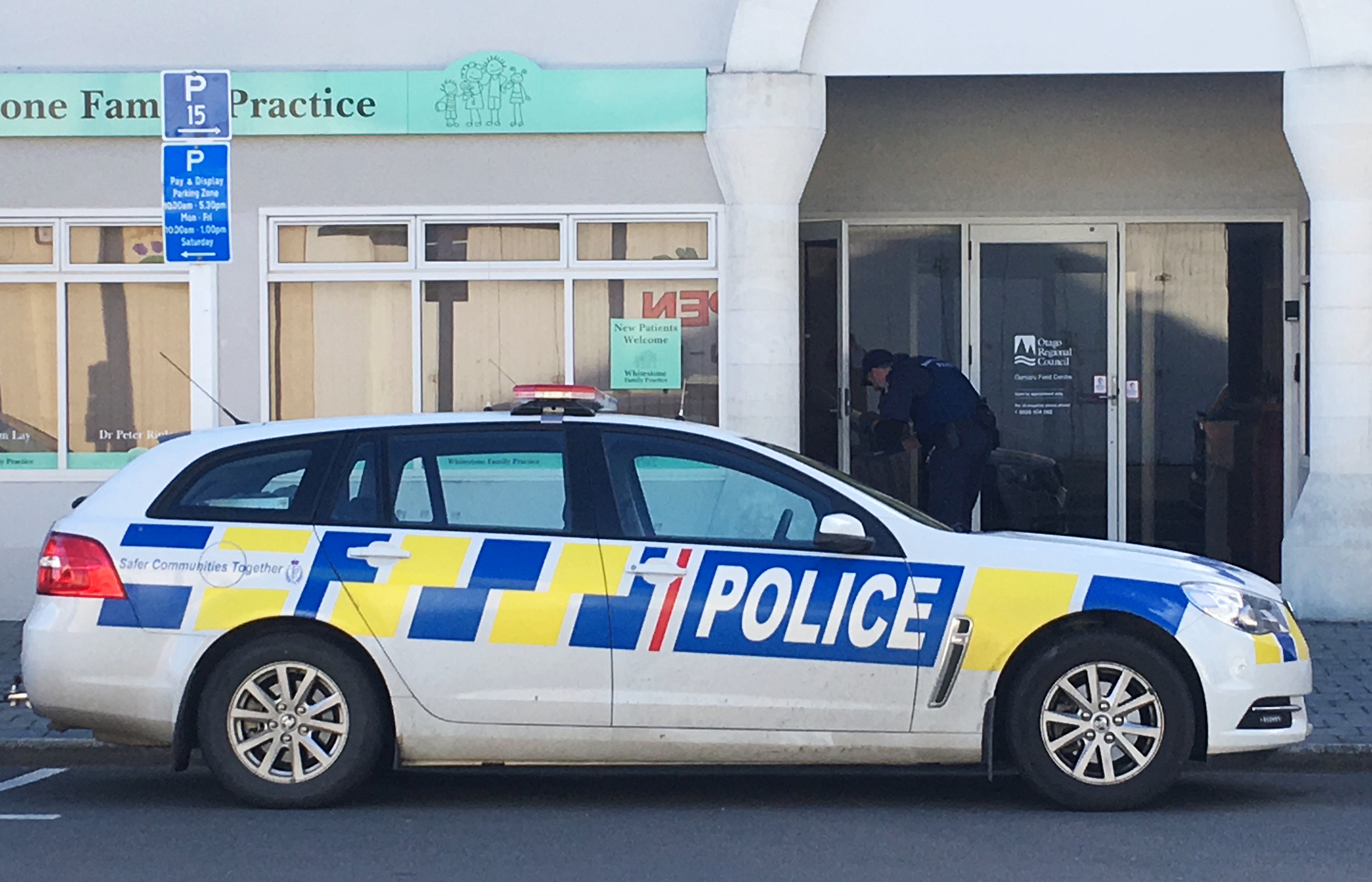 Police at the doctor's office this morning. PHOTO: HAMISH MACLEAN