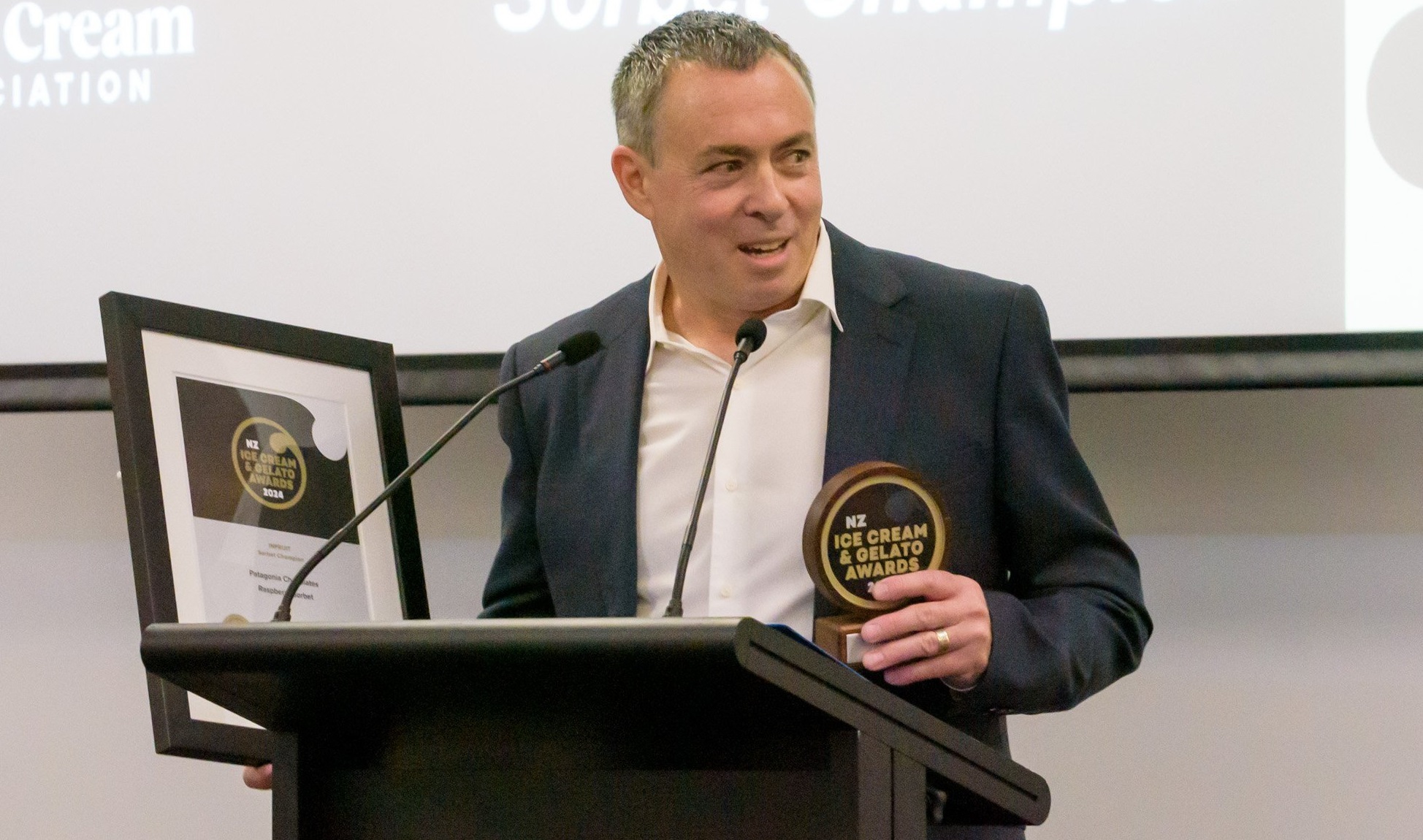 Patagonia’s co-owner Alex Gimenez accepts the trophies at the New Zealand Ice Cream & Gelato...