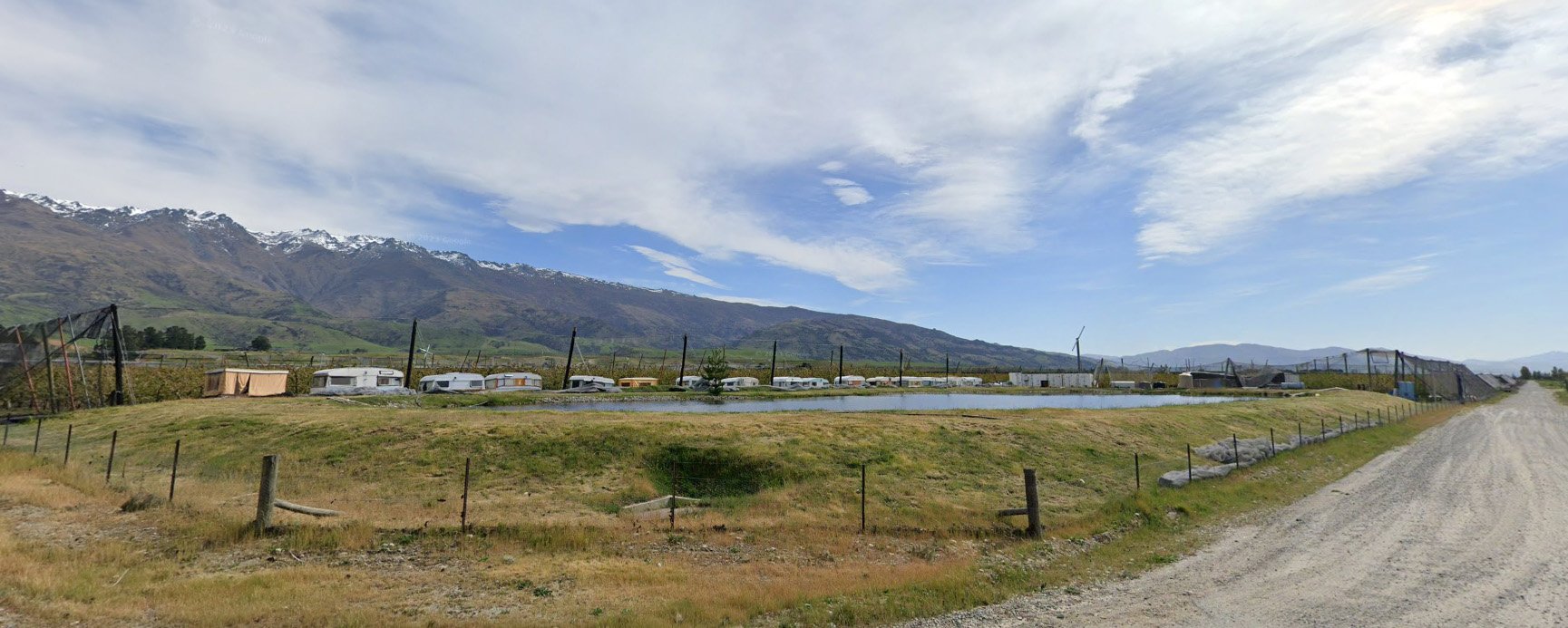 This line of caravans, being used as worker accommodation at Mt Pisa, were blown over by strong...