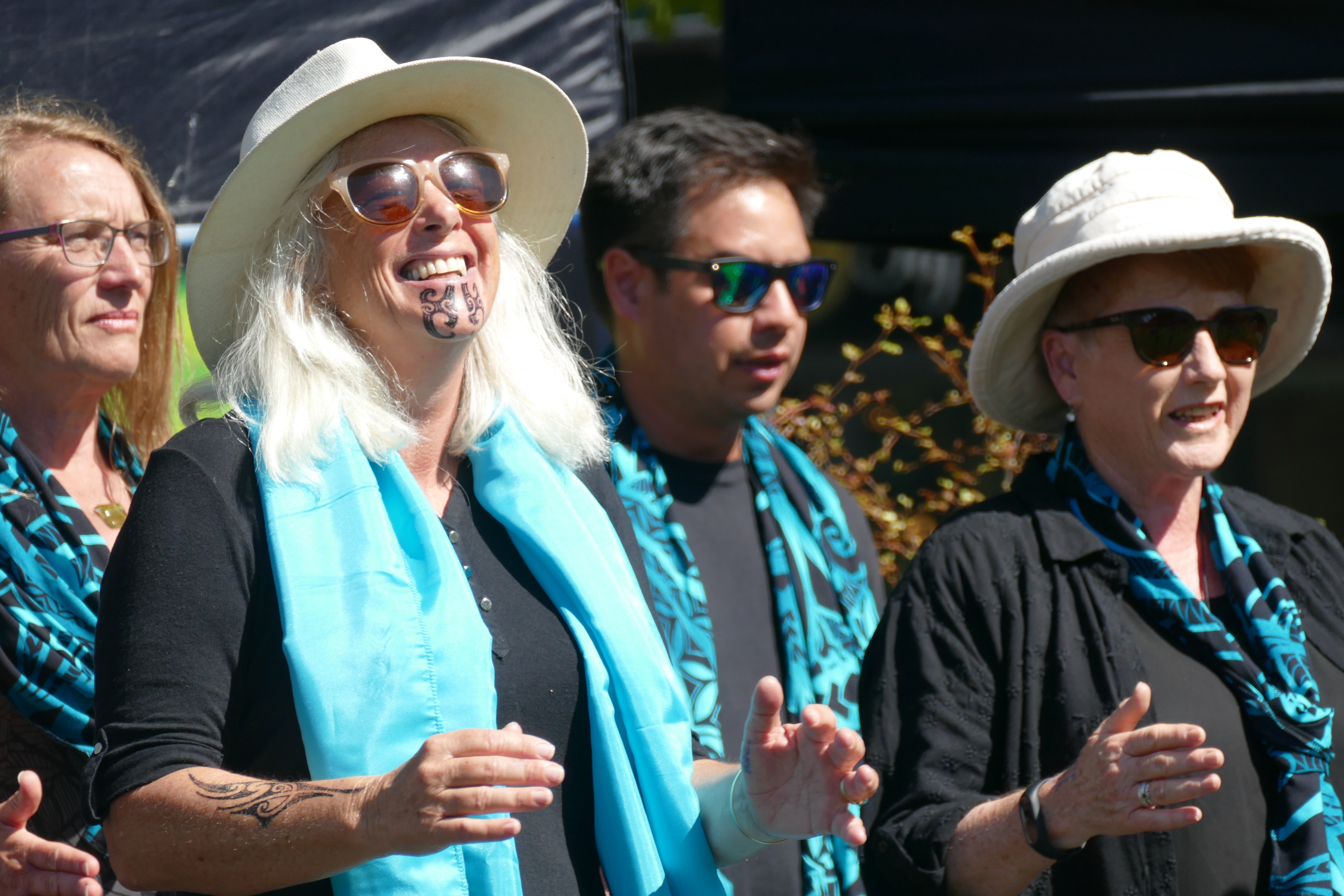 Otago regional councillor Alexa Forbes (second from left), of Queenstown, performs with waiata...